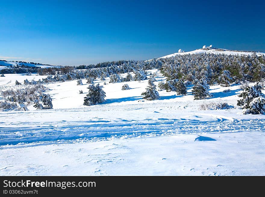 Beautiful view an a snowbound valley. Beautiful view an a snowbound valley