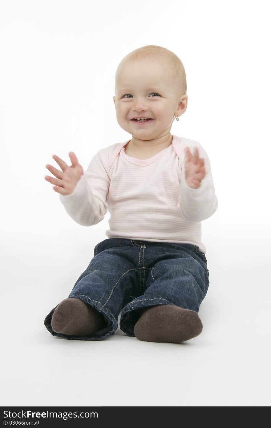 Merry dinky girl sit, on white background.