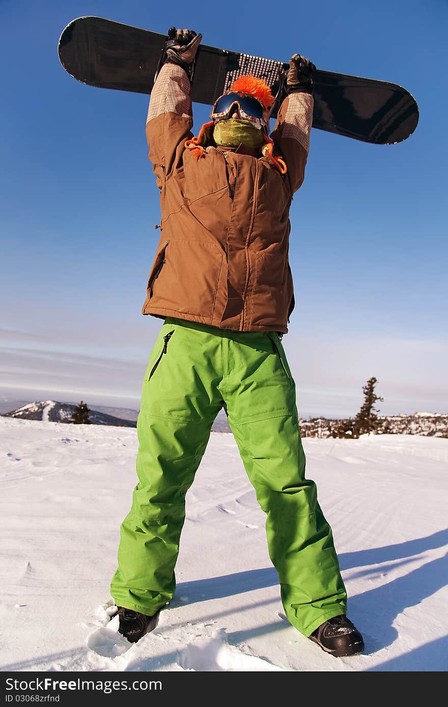 Portrait of a young man with the snowboard