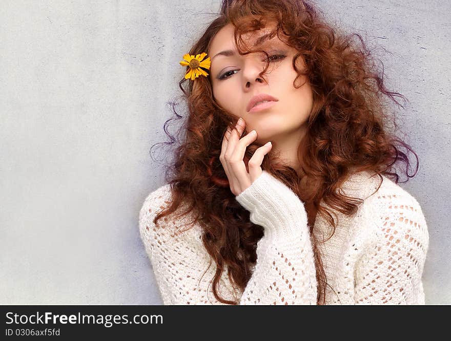 woman with curling hair. woman with curling hair