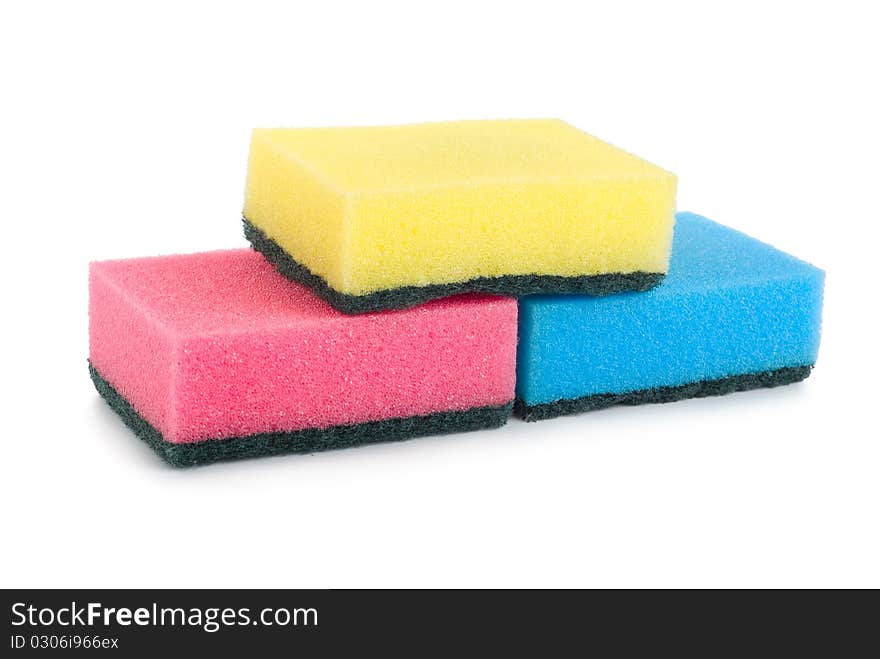 A three colored sponges isolated on white background