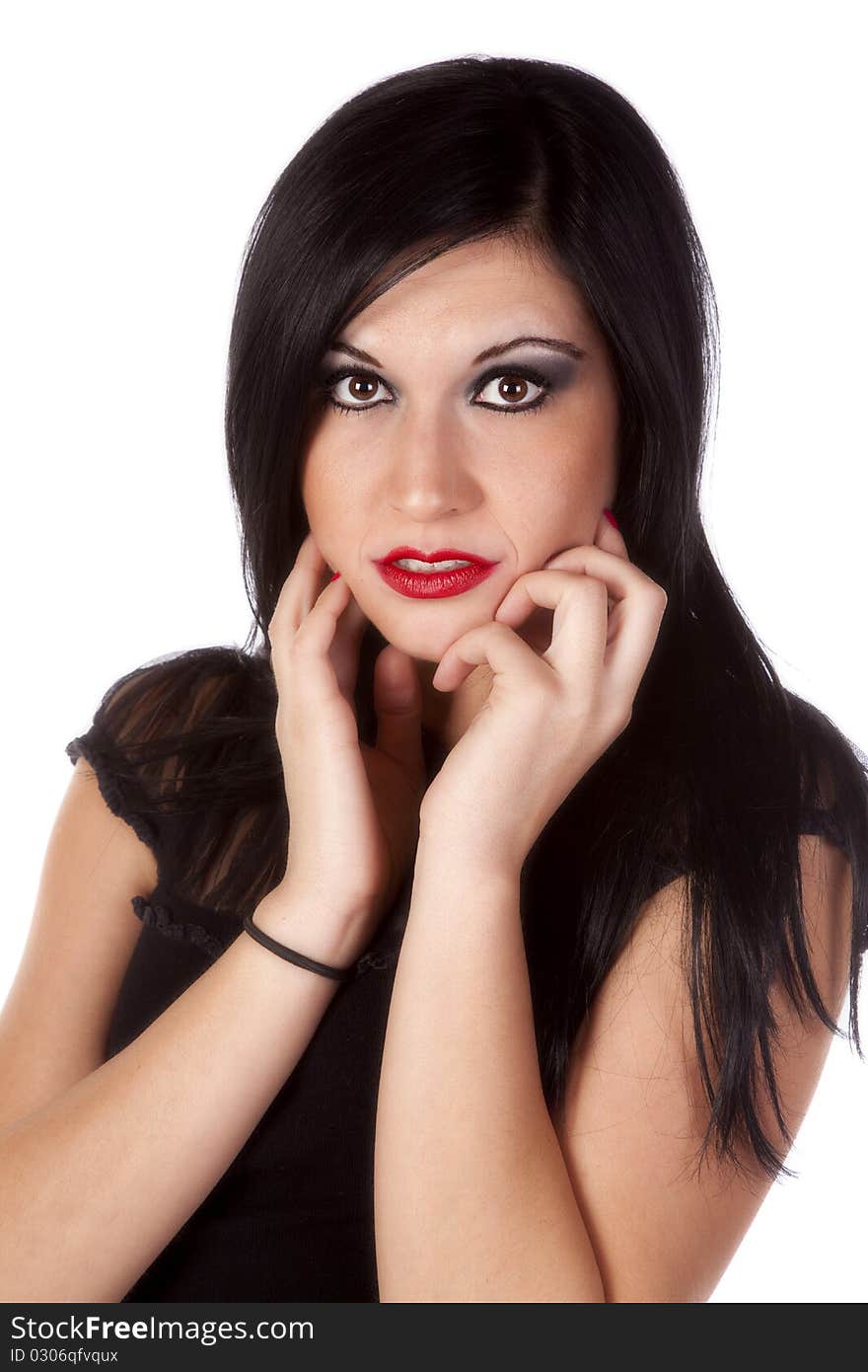 A portrait of a woman with dark hair. A portrait of a woman with dark hair.