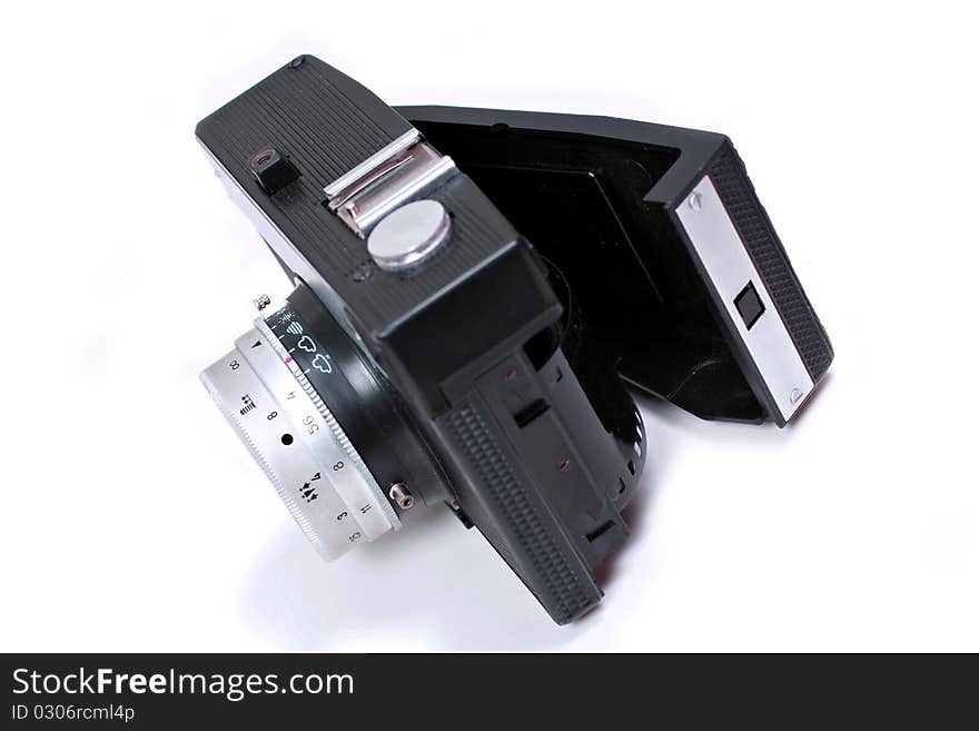 Open old black camera on a white background