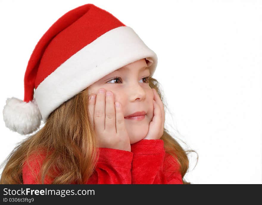 Little girl in Christmas hat , isolated on white