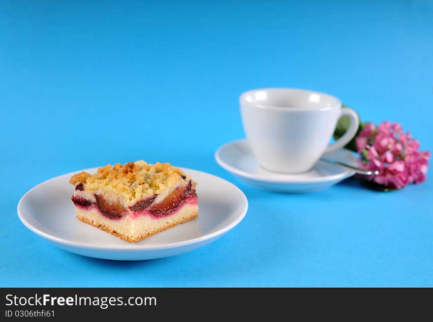 Place setting with cake and coffee