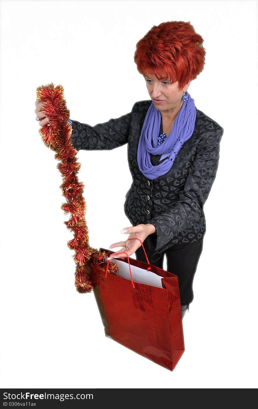 Woman with purchases, on a white background, it is isolated.