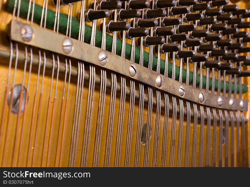 The insides of a vintage piano. The insides of a vintage piano