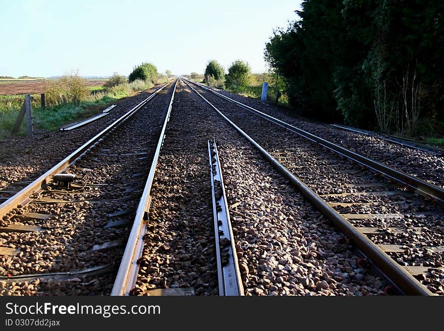 Image of railway lines in Bedfordshire U.K photo taken on a overcast day. Image of railway lines in Bedfordshire U.K photo taken on a overcast day