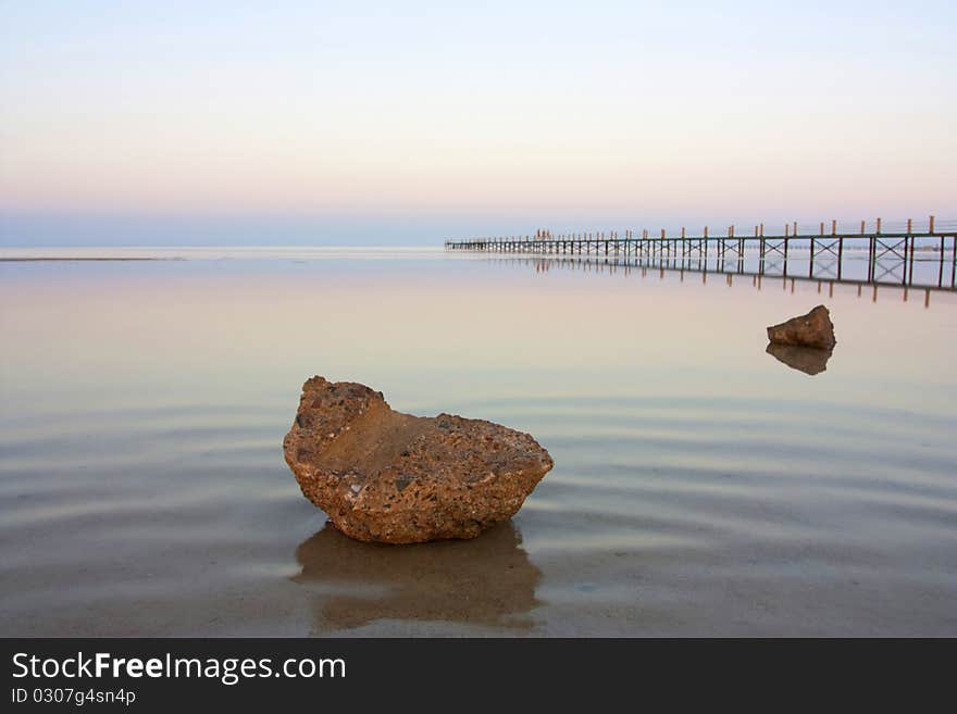 Rocks in water on the beach