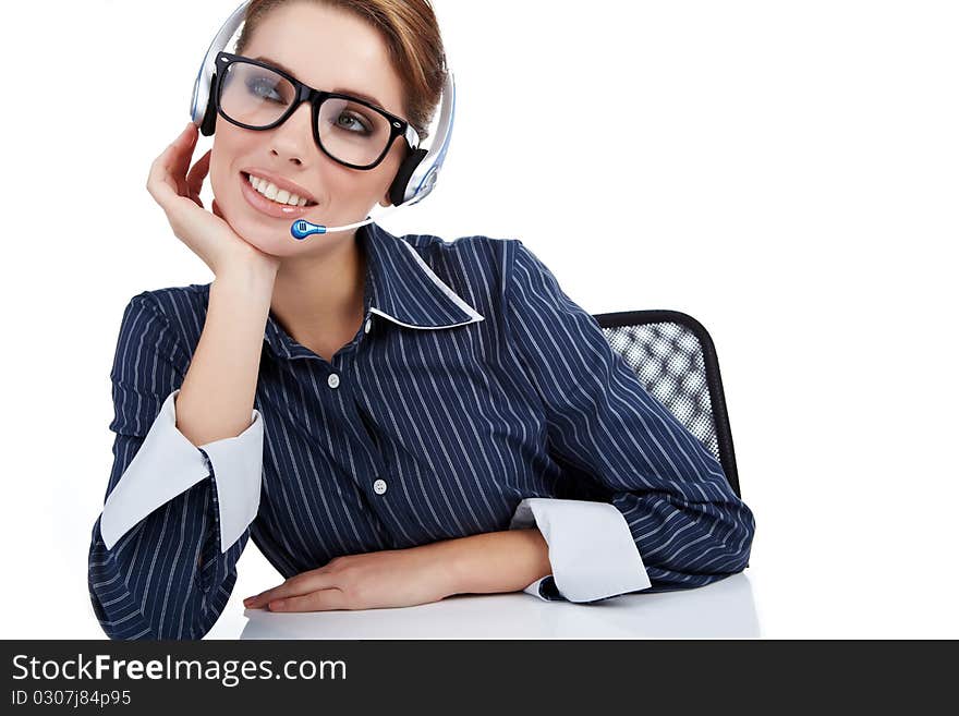 Customer Representative with headset smiling during a telephone conversation