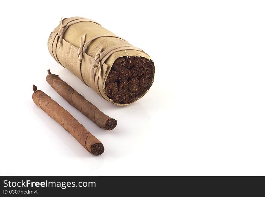 Two hand rolled cigars and a cuban humidor isolated on a white background