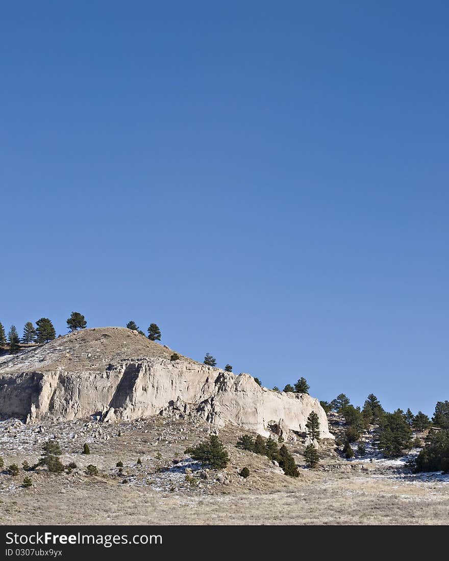 Large hill with cliffs