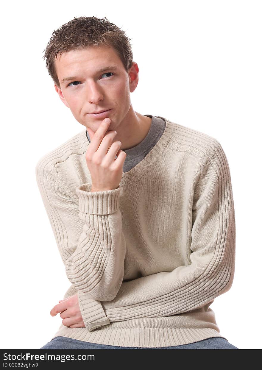 Pensive young man looking up isolated over white background. Pensive young man looking up isolated over white background