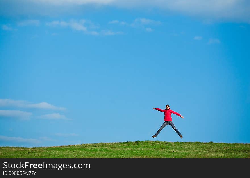 Joyful Young Woman Jumping