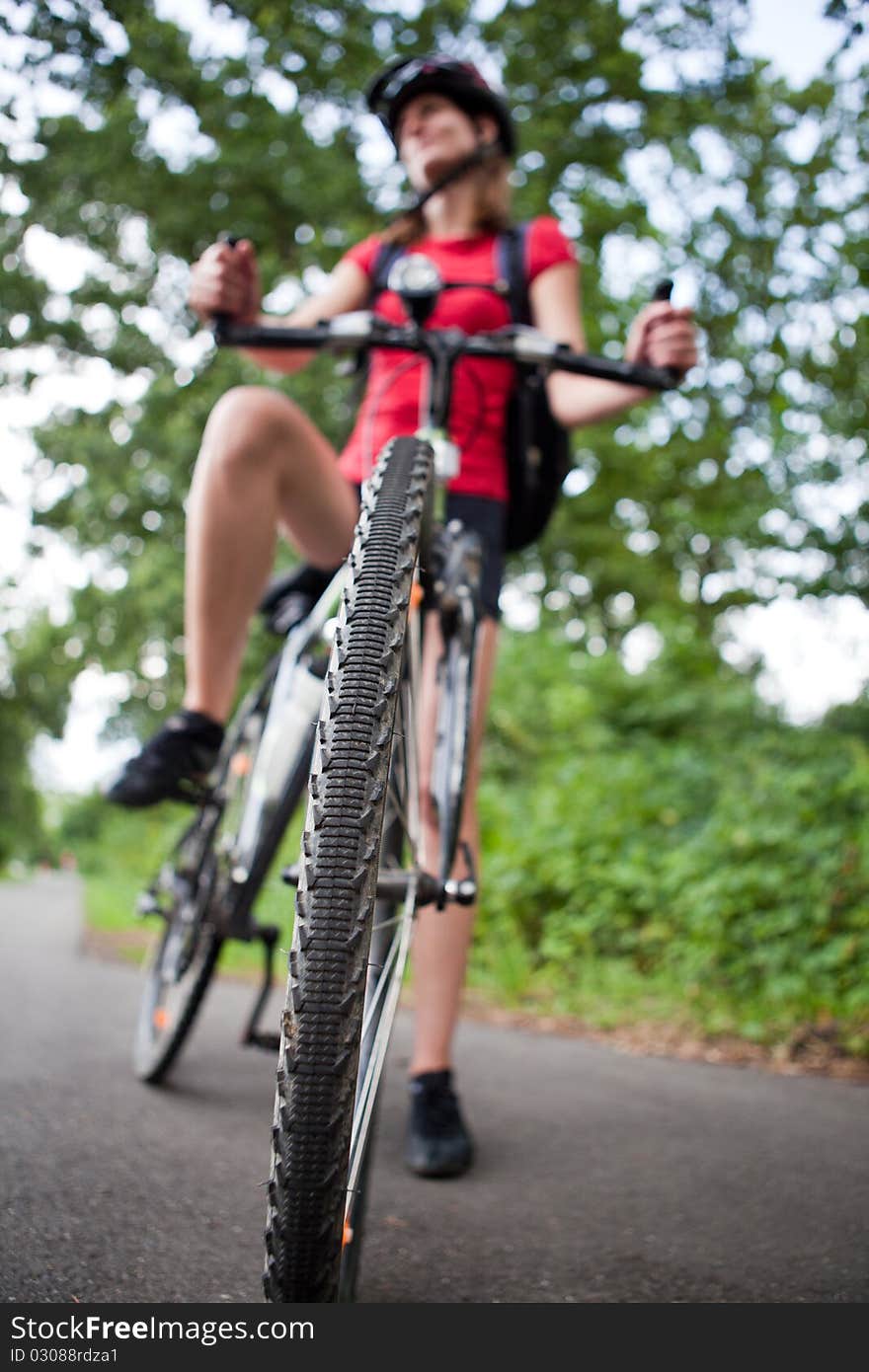 Female Biker  On Her Mountain Bike