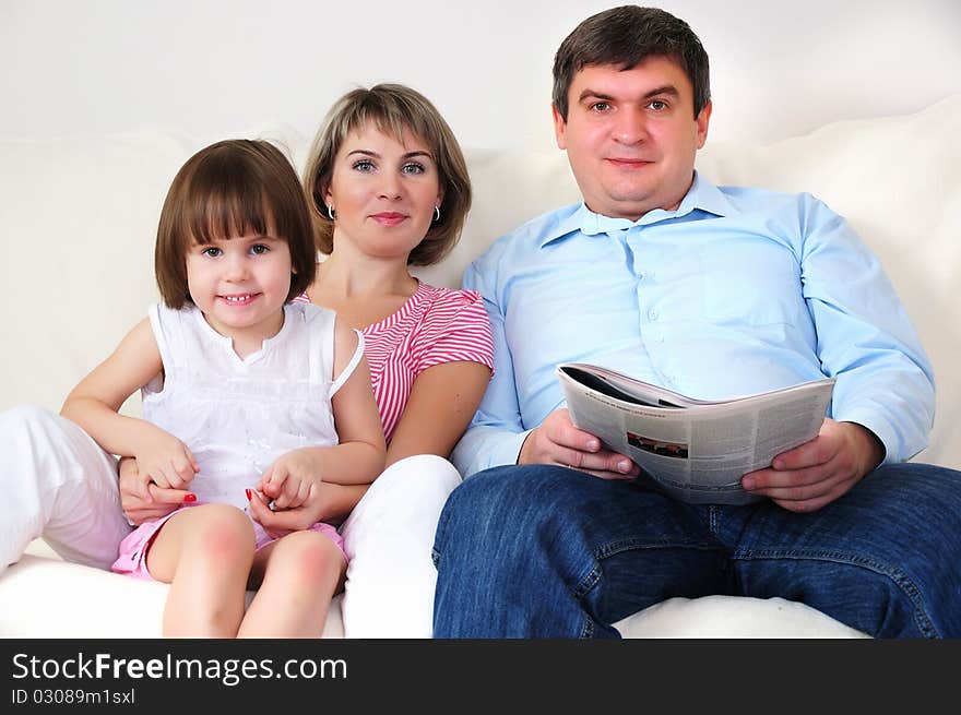 Dad, Mom and their little daughter fun time together.