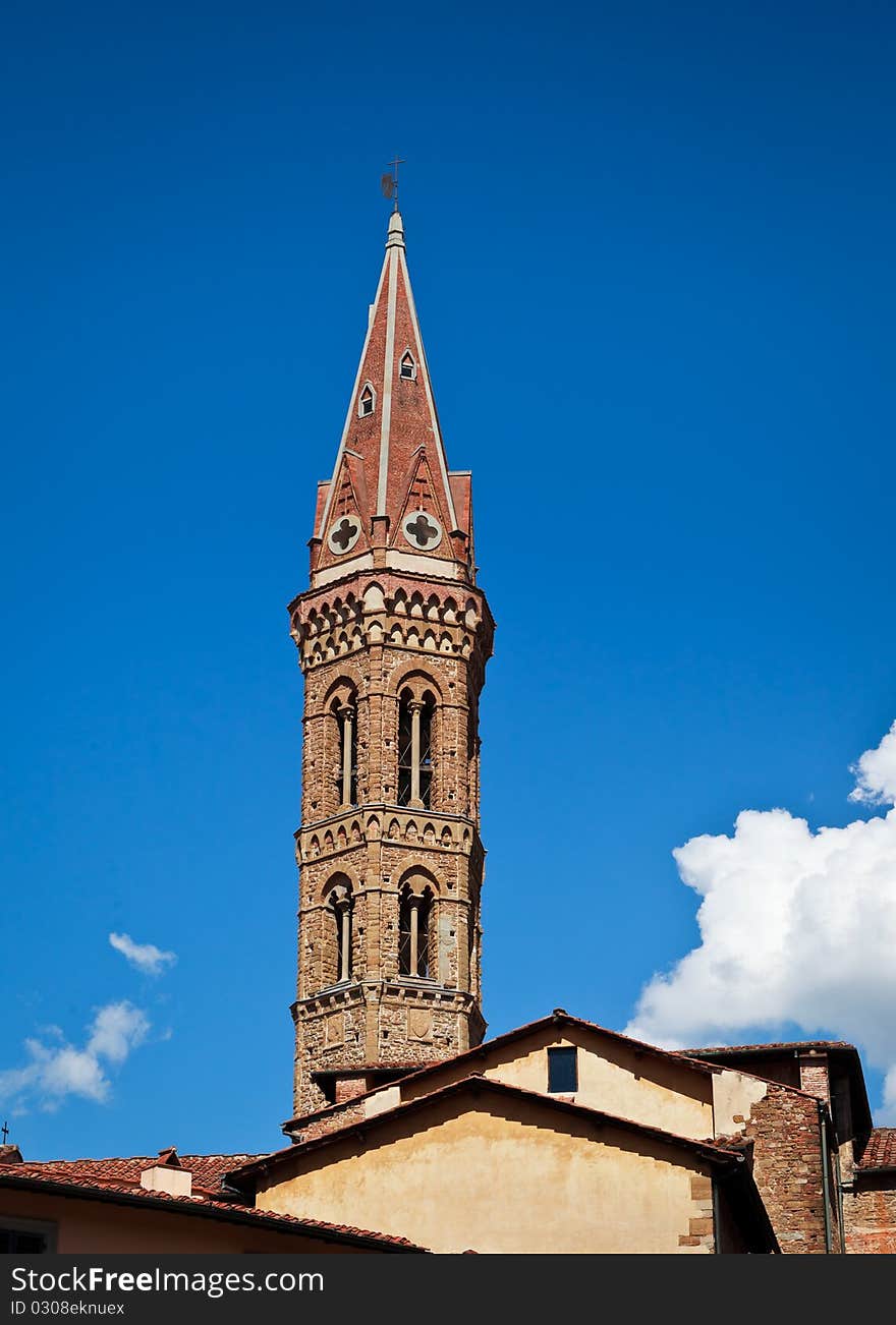 Church Steeple against a slightly cloudy, blue sky