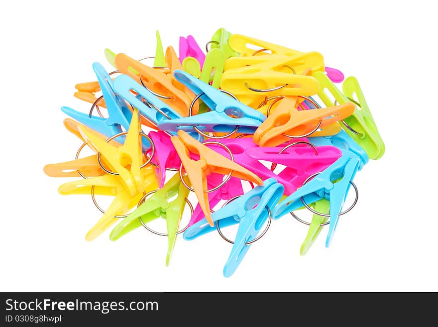 Colorful clothespins isolated on white background