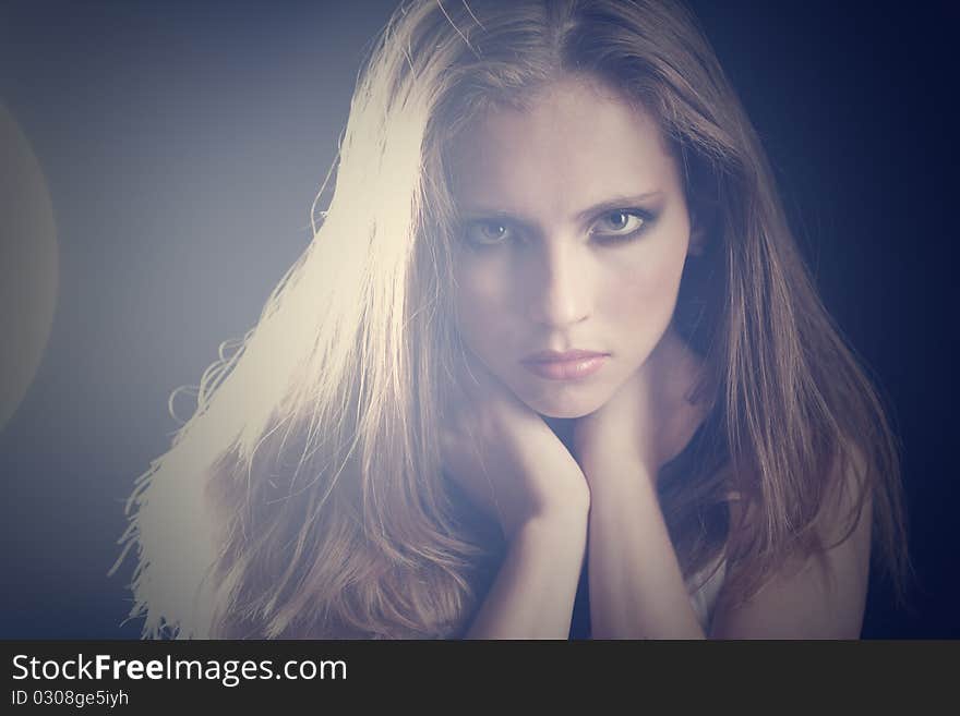 Beauty portrait of a young girl with smoky eyes. Beauty portrait of a young girl with smoky eyes