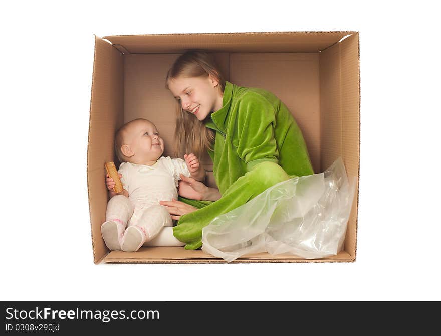 Mother Sit With Baby Eating Cookie