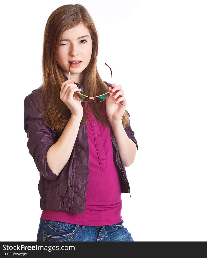 A beautiful girl with glasses is winking. isolated on white background. A beautiful girl with glasses is winking. isolated on white background