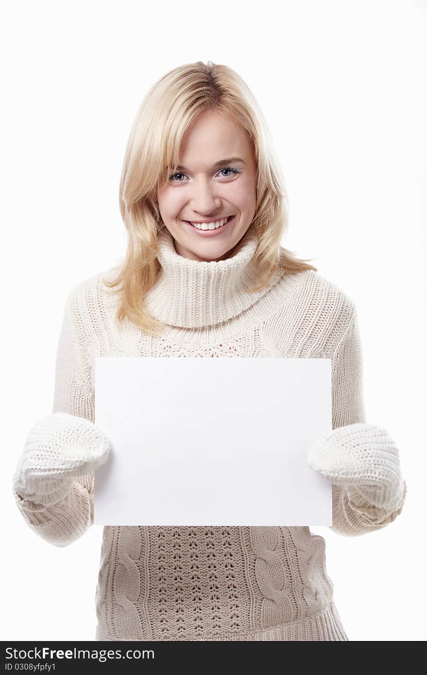 Attractive woman holding a blank white plate isolated. Attractive woman holding a blank white plate isolated