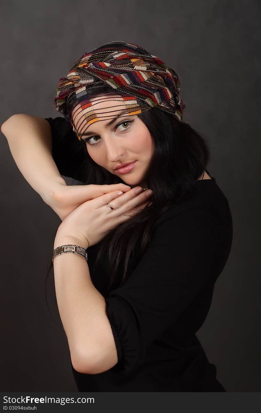 Portrait of beautiful girl in a shawl