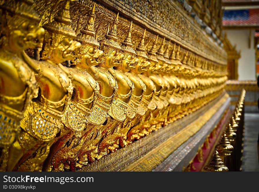 Beautiful golden garudas in Thai temple. Beautiful golden garudas in Thai temple.