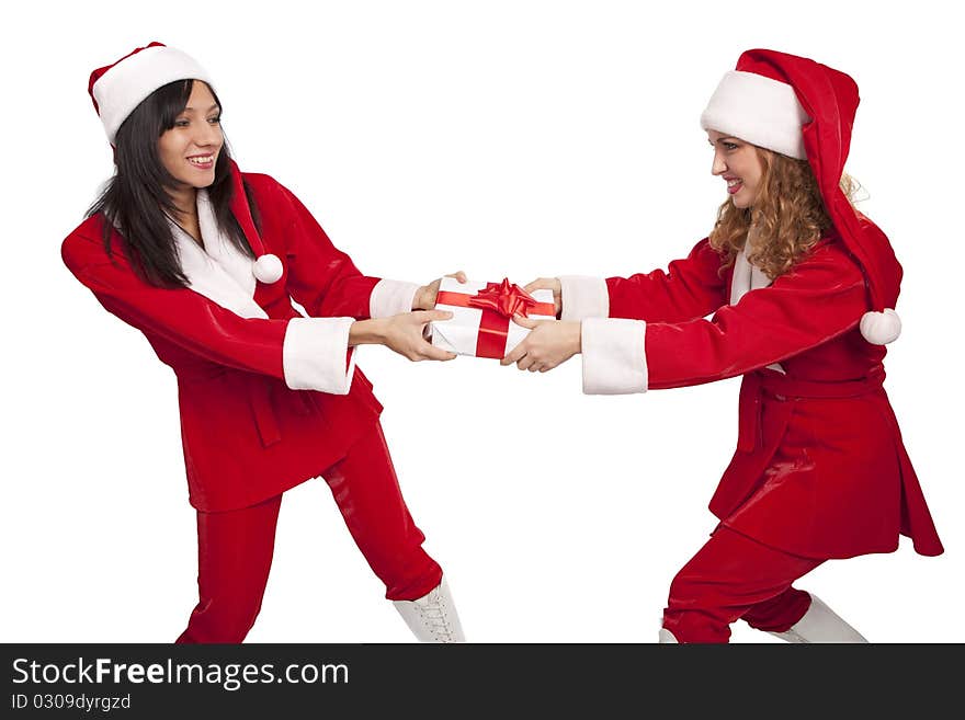 Young Santas take from each other a gift box isolated on white. Young Santas take from each other a gift box isolated on white