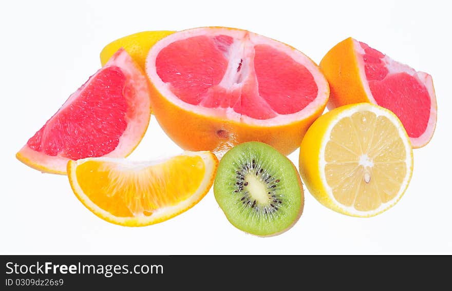 Orange, lemon, grapefruit and kiwi fruit on white background isolated. Orange, lemon, grapefruit and kiwi fruit on white background isolated.