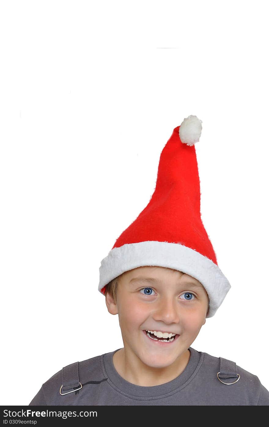 Smiling adorable child with Santa Hat