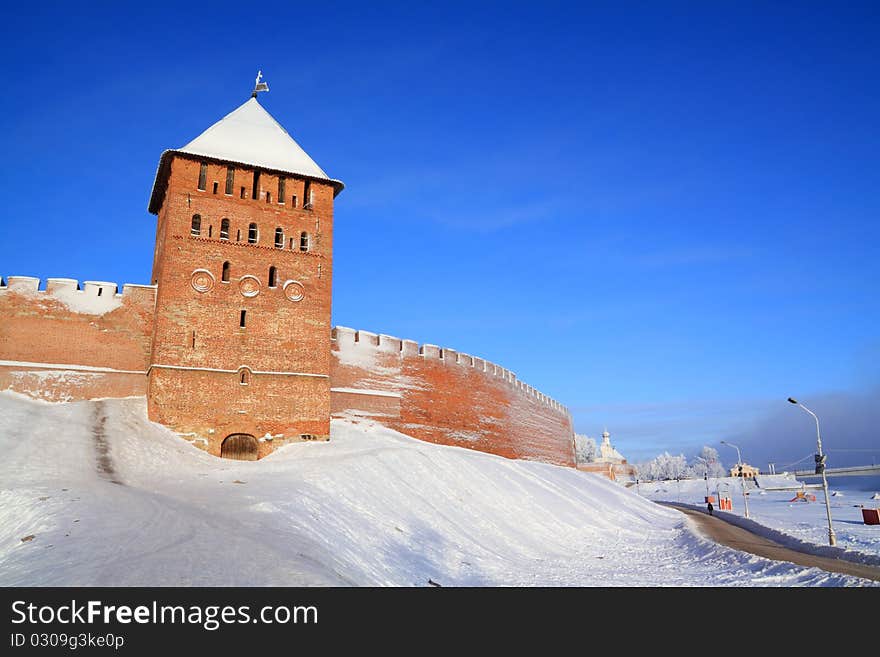 Ancient brick fortress on the snow hill. Ancient brick fortress on the snow hill