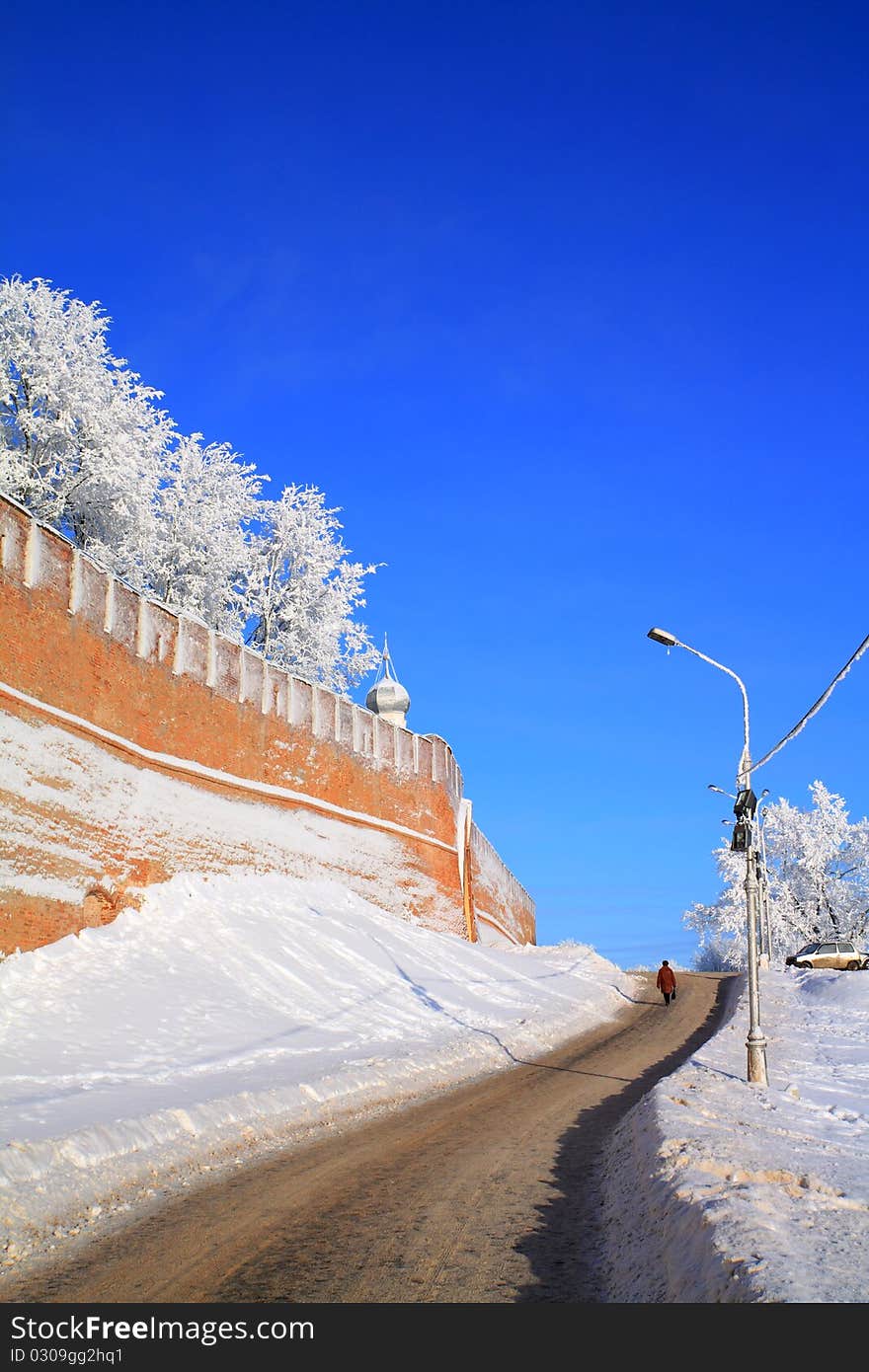 Ancient brick fortress on the snow hill. Ancient brick fortress on the snow hill