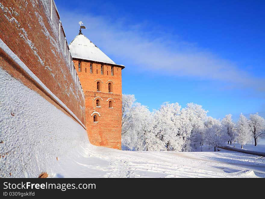 Ancient brick fortress on the snow hill. Ancient brick fortress on the snow hill