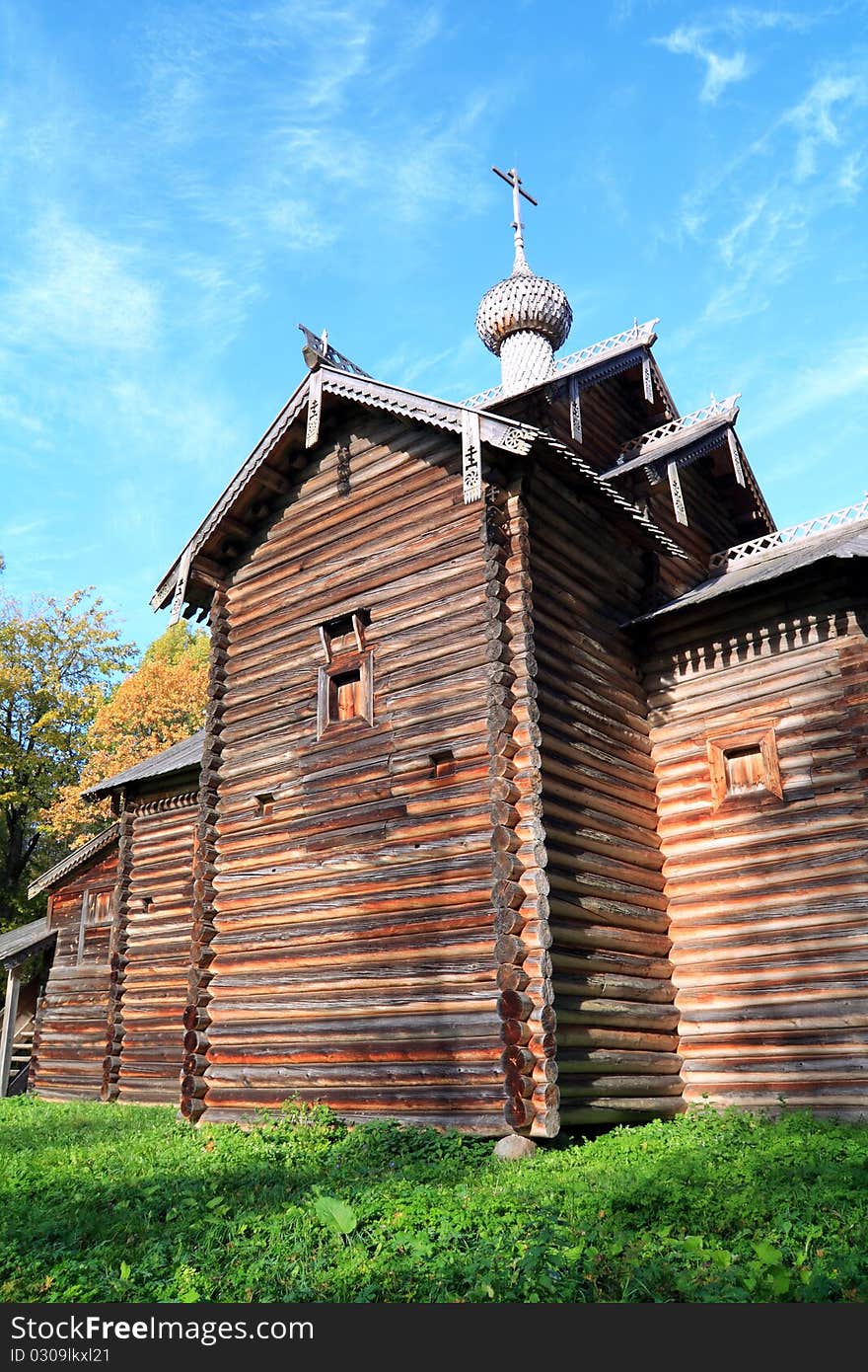 Aging wooden chapel in village