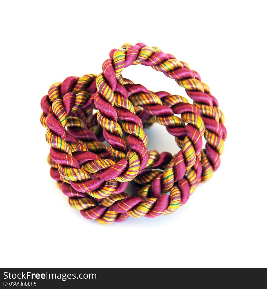 A tangled ball of twine on white background