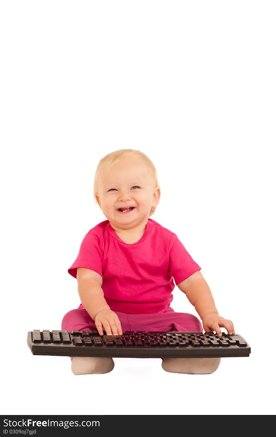 Cute cheerful girl typing on computer keyboard on white