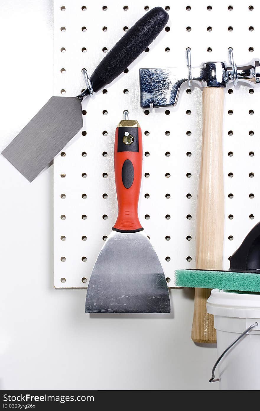 Different tools used for wall plastering and home improvement. Different tools used for wall plastering and home improvement.