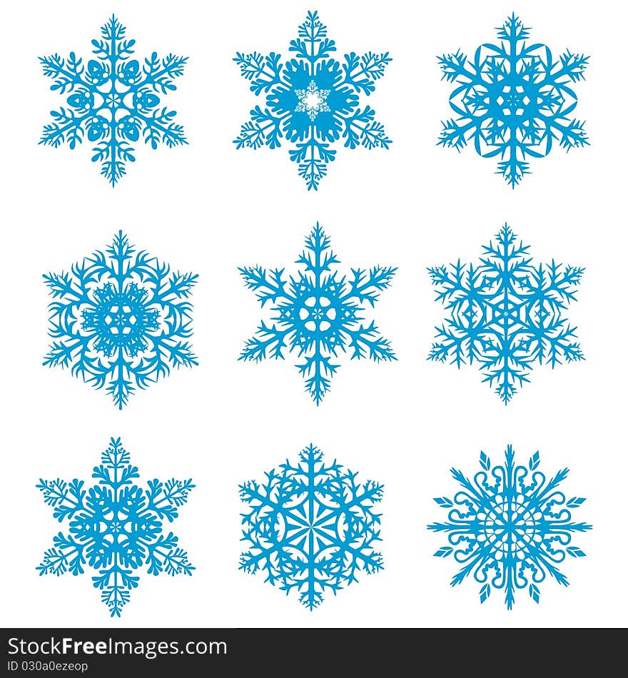 Snowflakes of different shapes on a white background