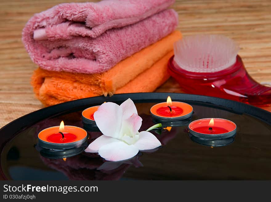 Floating candles in wooden bowls