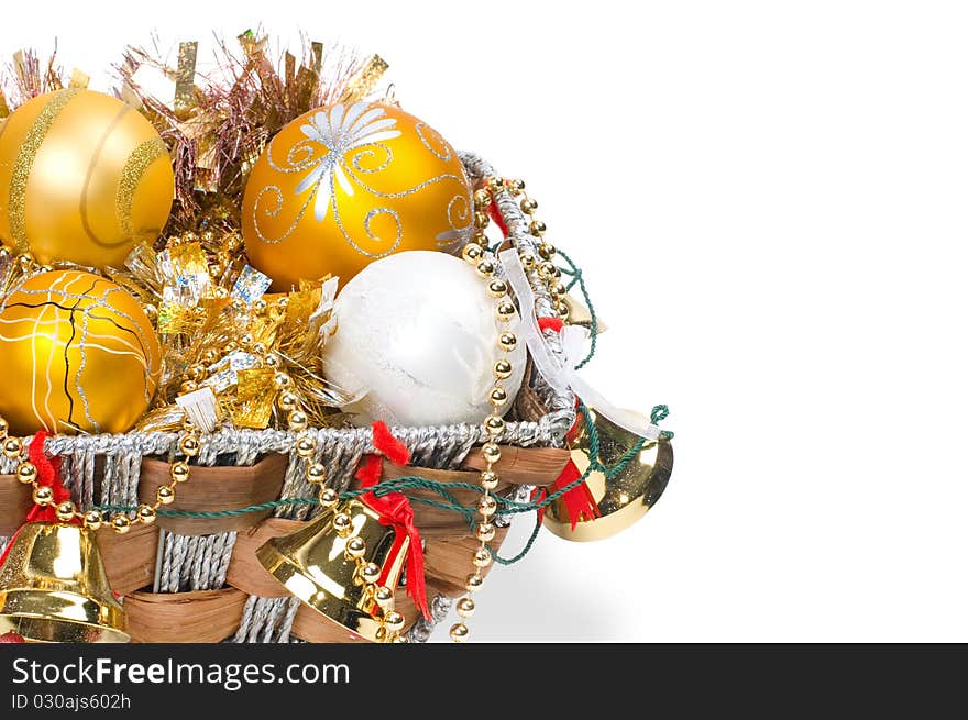 New Year's decoration in a wooden basket with hand bells. New Year's decoration in a wooden basket with hand bells