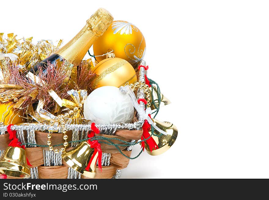 New Year's decoration in a wooden basket with hand bells. New Year's decoration in a wooden basket with hand bells