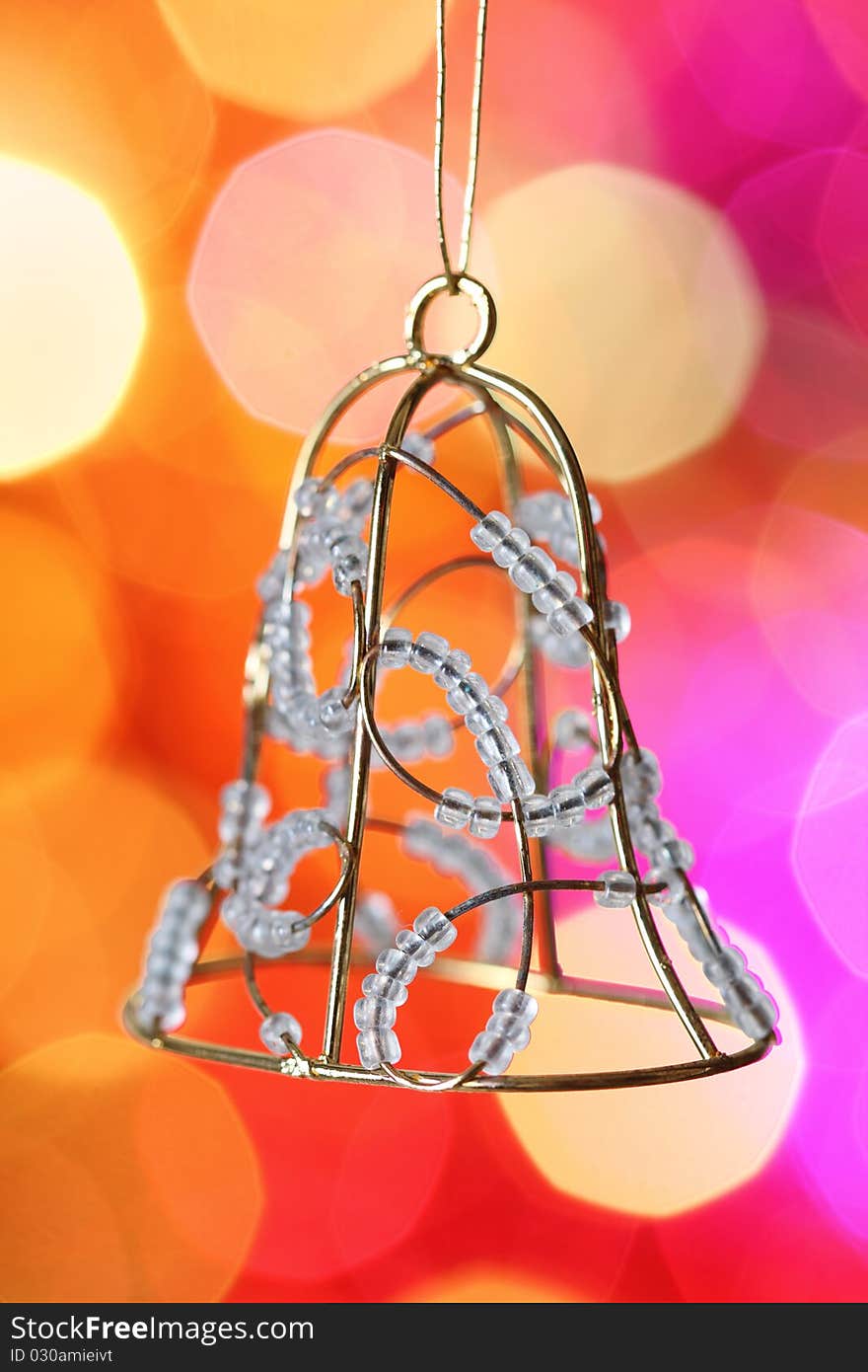 Christmas bell against blurred background