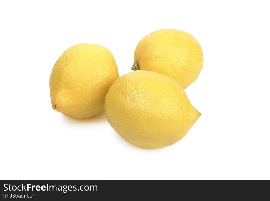 Juicy ripe lemons isolated on white background