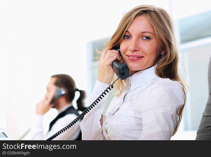 Young girl in his office