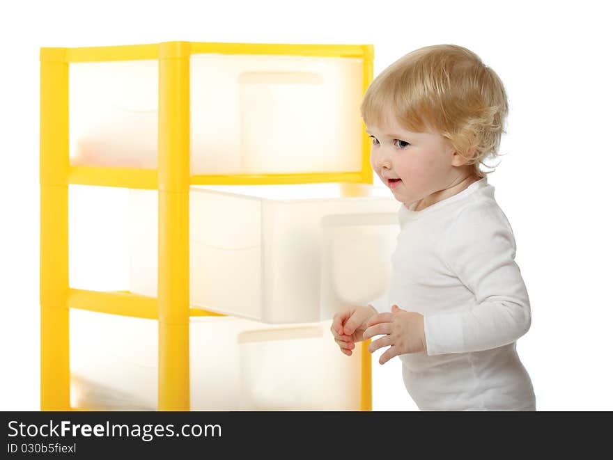 1 year old baby having just opened a what-not's box isolated on white. 1 year old baby having just opened a what-not's box isolated on white