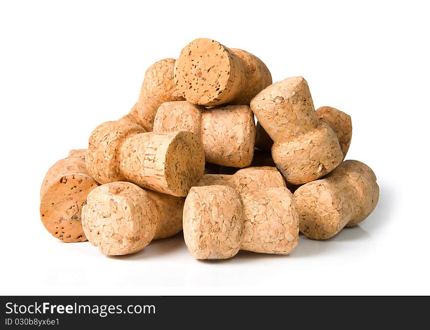 Pile of corks on a white background