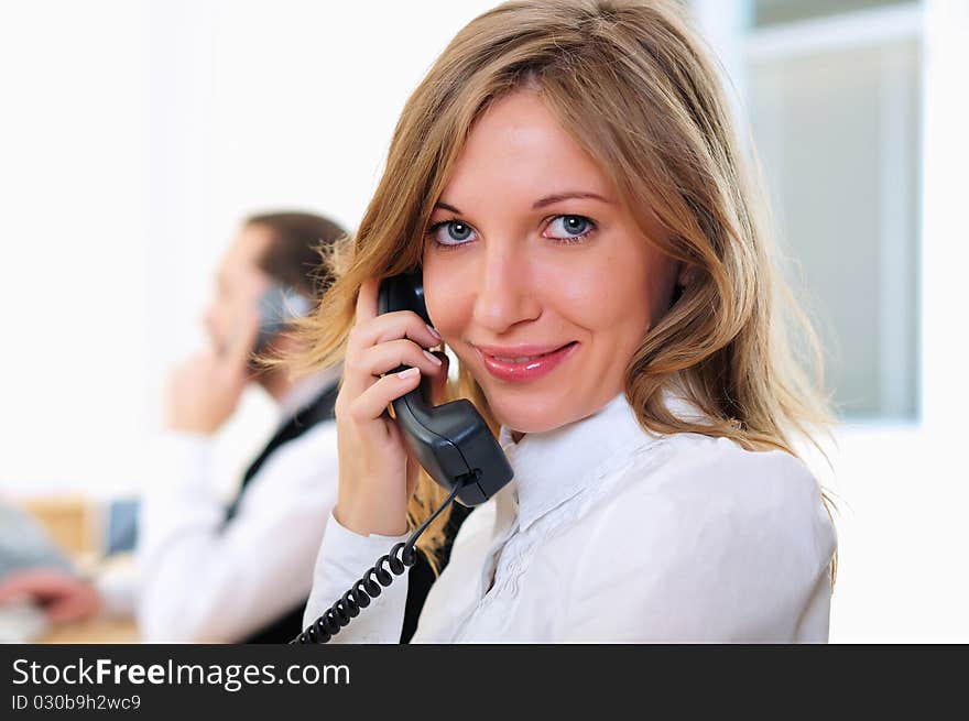 Young girl in his office