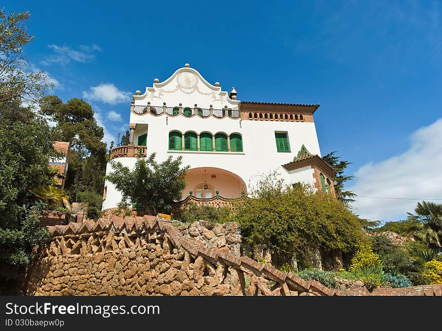 Mediterrenean style house in Park Guell, Barcelona. Spain. Photo taken on September 03, 2010. Mediterrenean style house in Park Guell, Barcelona. Spain. Photo taken on September 03, 2010.