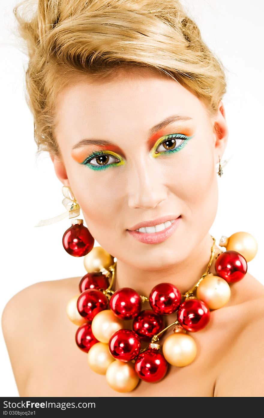 Amazing smiling young woman with necklace from xmas balls. Amazing smiling young woman with necklace from xmas balls